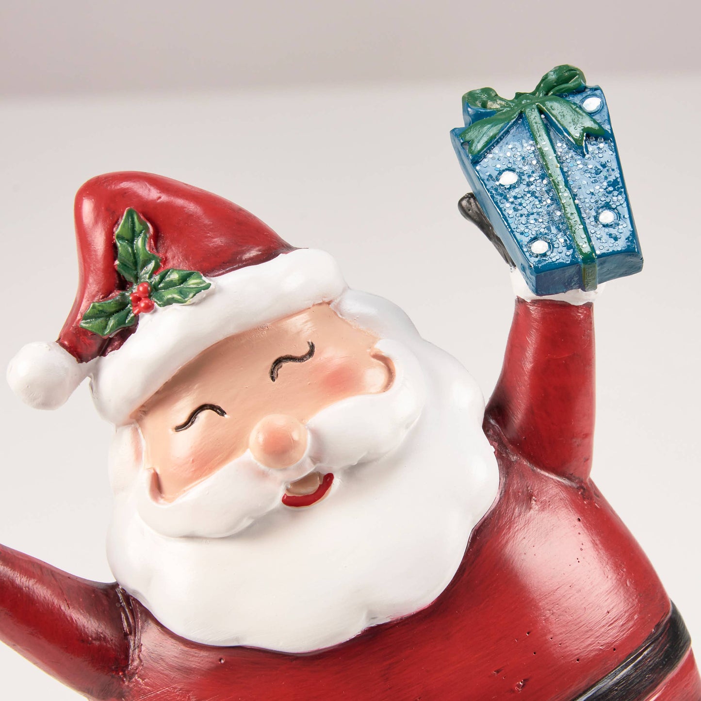Skating Santa Figurine