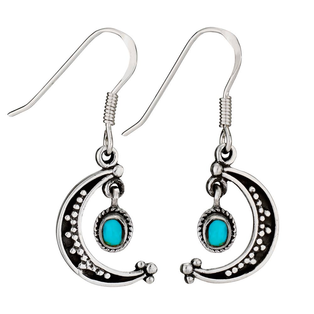 Silver earrings with turquoise stones on a white background