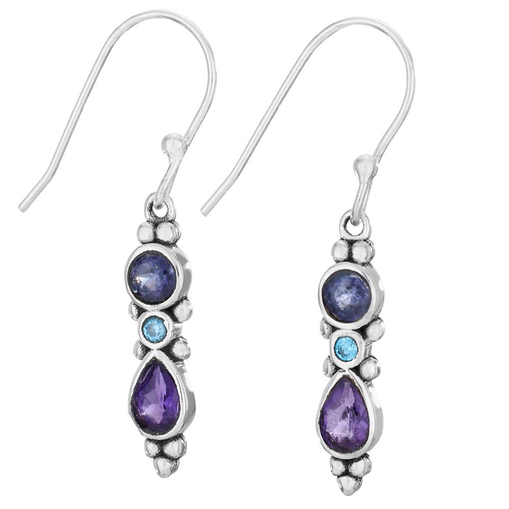 Silver earrings with purple and blue gemstones on a white background