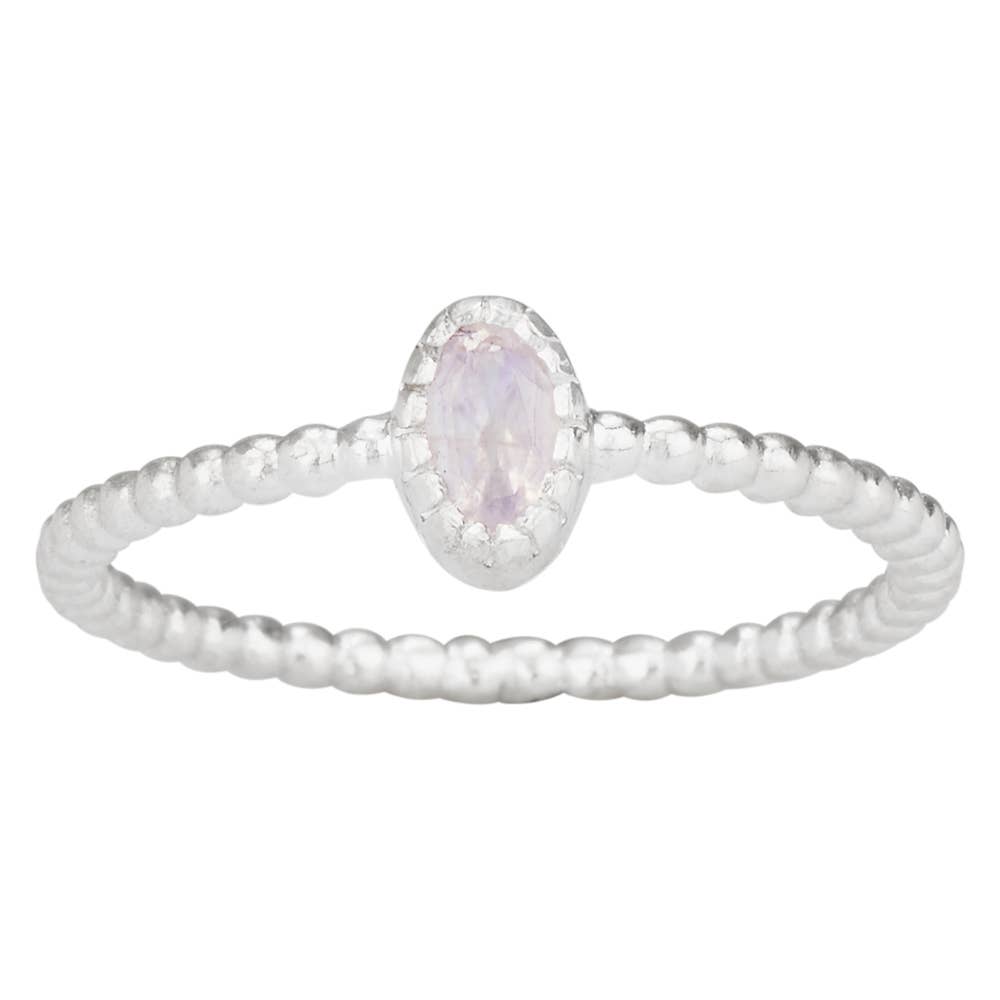 A sterling silver beaded ring with an oval-cut light moonstone center stone in a textured bezel setting, shown against a plain white background.