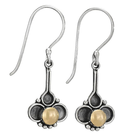 Pair of Sterling silver earrings with floral design and central gold on a white background