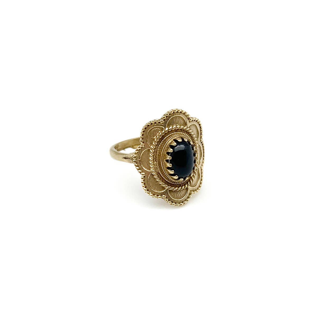 Gold-tone brass ring with a black gemstone on a white background