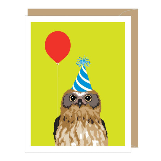 Card with an owl wearing a party hat and holding a red balloon on a green background