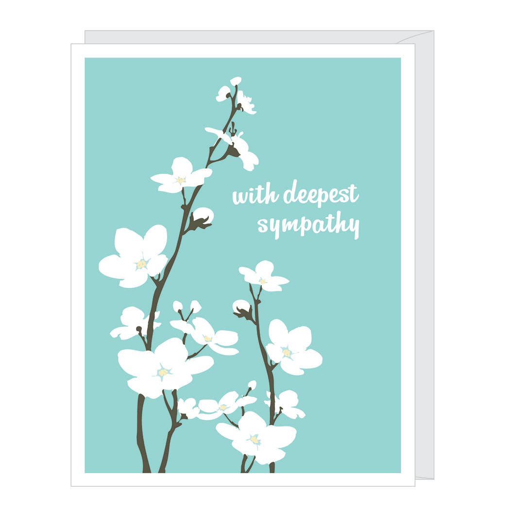 Card with white flowers on a blue background and 'with deepest sympathy' text.