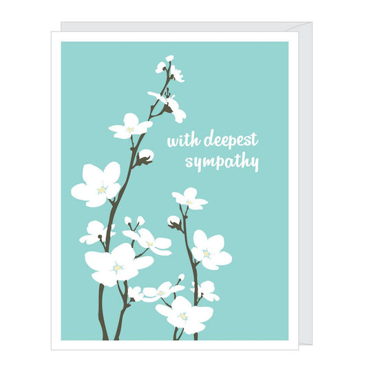 Card with white flowers on a blue background and 'with deepest sympathy' text.