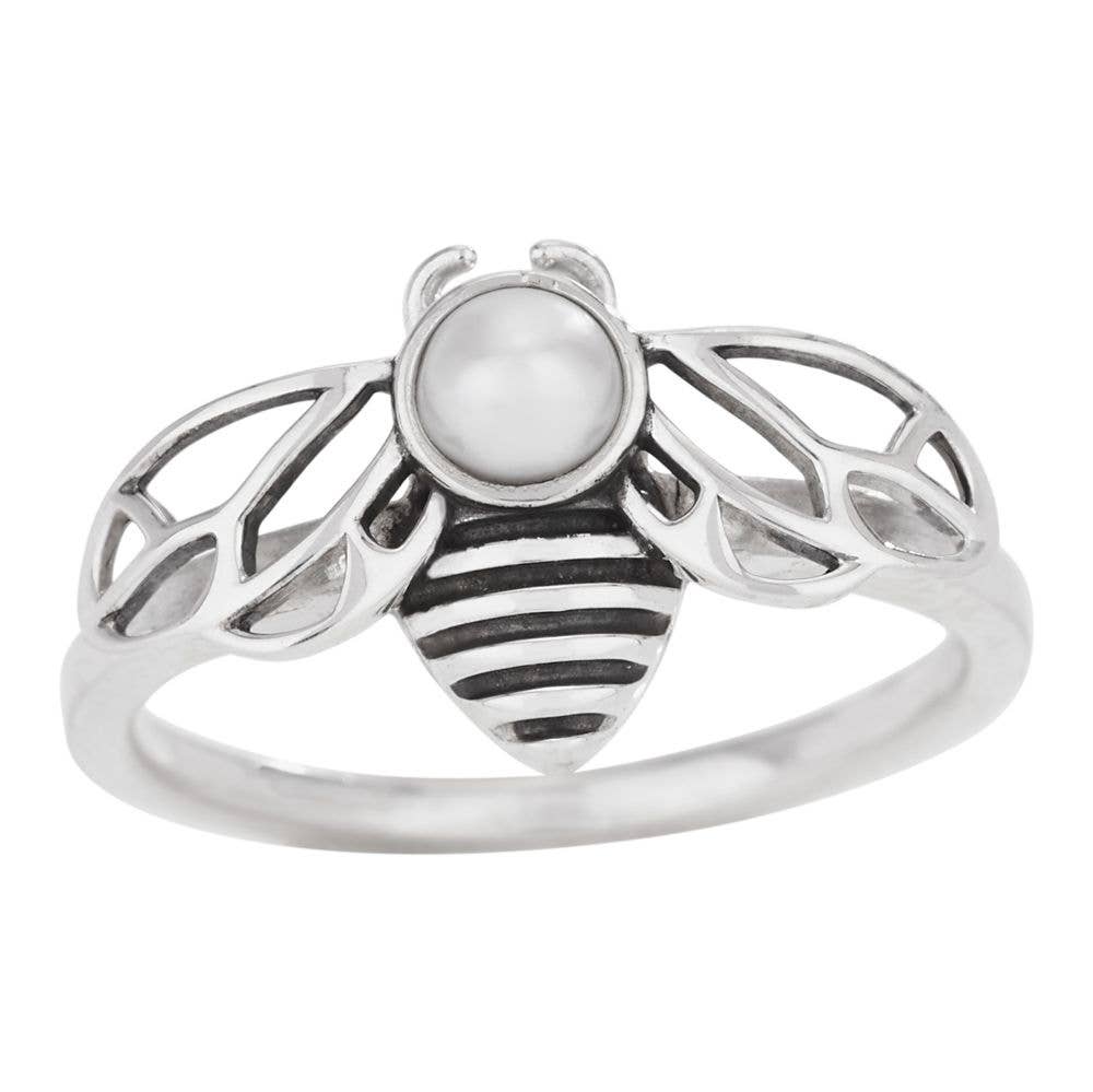 Sterling Silver ring shaped like a bee with a pearl on a white background