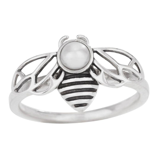 Sterling Silver ring shaped like a bee with a pearl on a white background