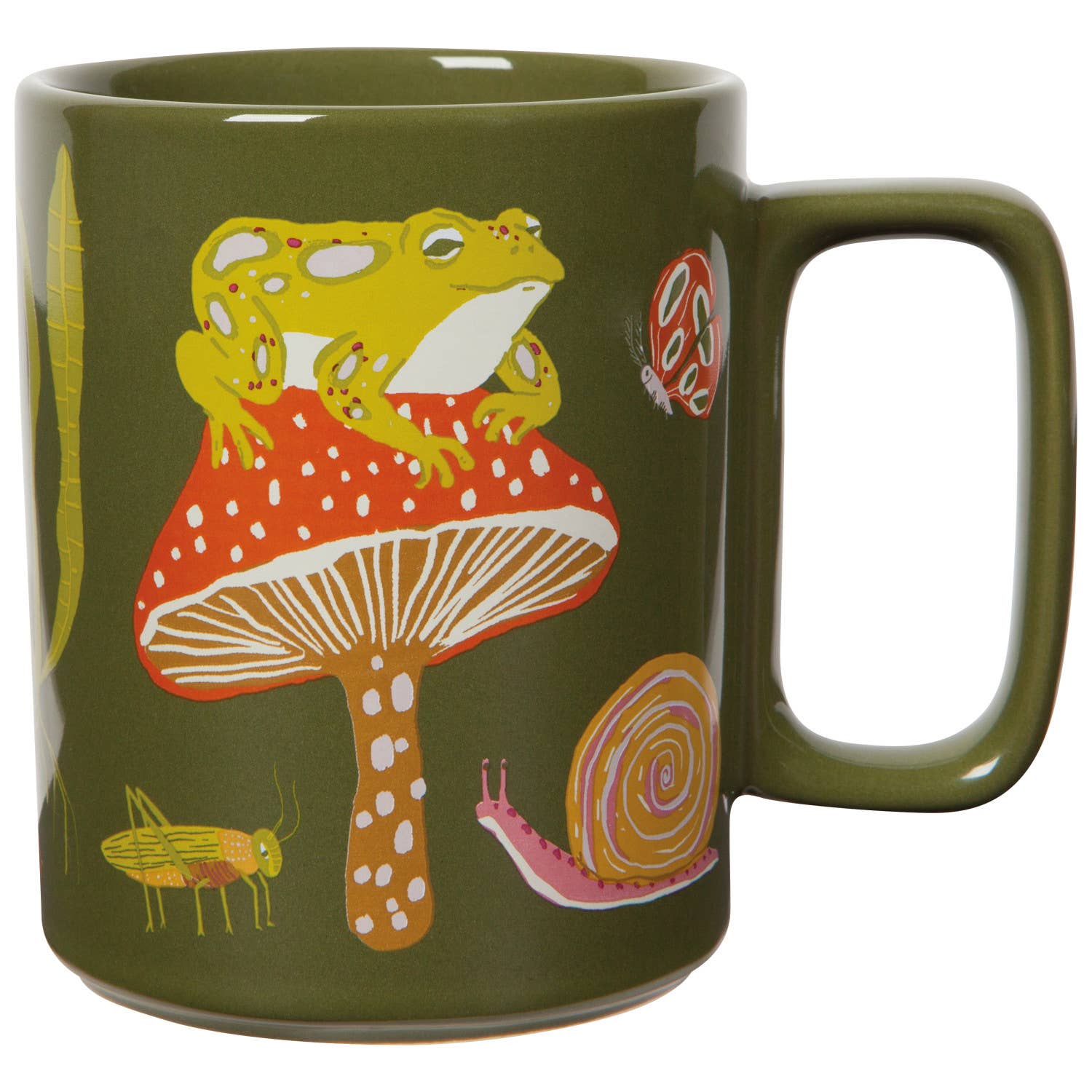 Green mug with a frog on a mushroom design on a white background