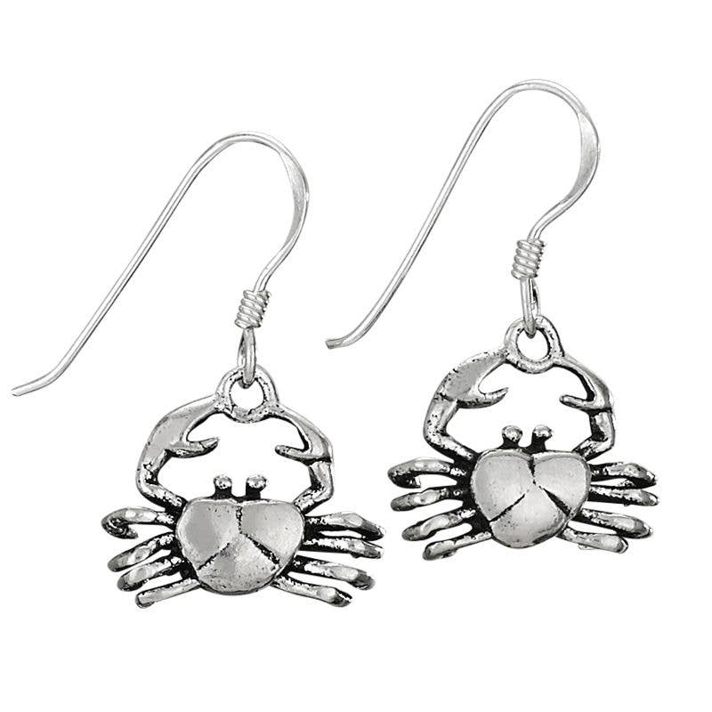 Silver crab-shaped earrings on a white background
