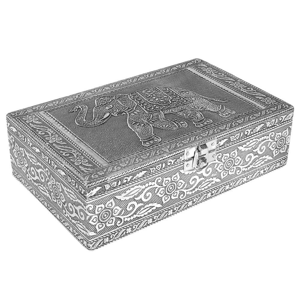 Decorative tin trinket box with elephant design on a white background