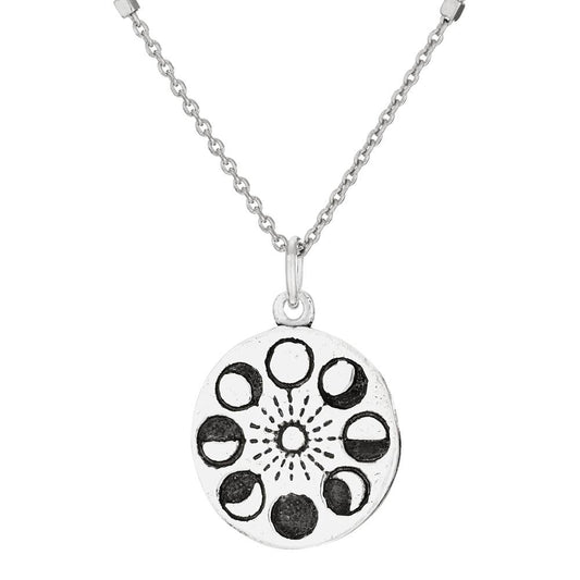Silver necklace with a circular pendant featuring moon phases on a white background