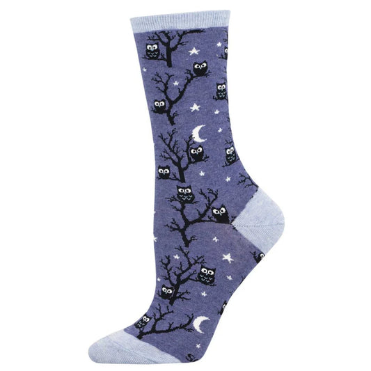 Blue sock with a nighttime owl pattern on a white background