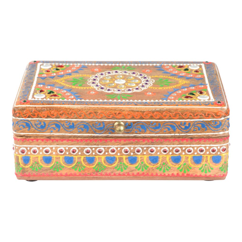 Decorative trinket box with colorful patterns on a white background