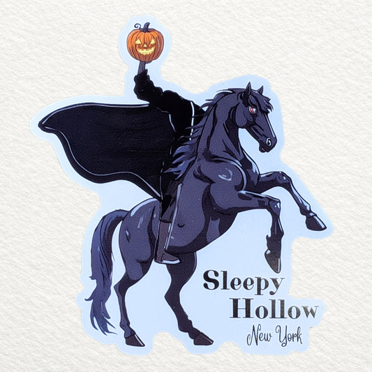 A magnet design featuring the Sleepy Hollow Headless Horseman holding a Jack O-lantern, mounted on a black horse, with the text 'Sleepy Hollow New York' at the bottom.