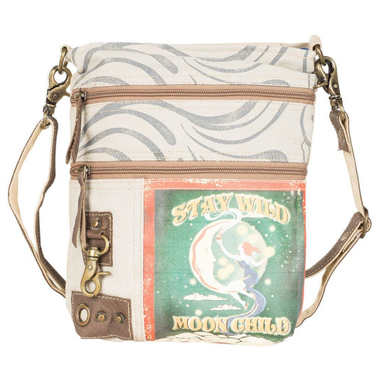Crossbody bag with 'Stay Wild Moon Child' design on a white background