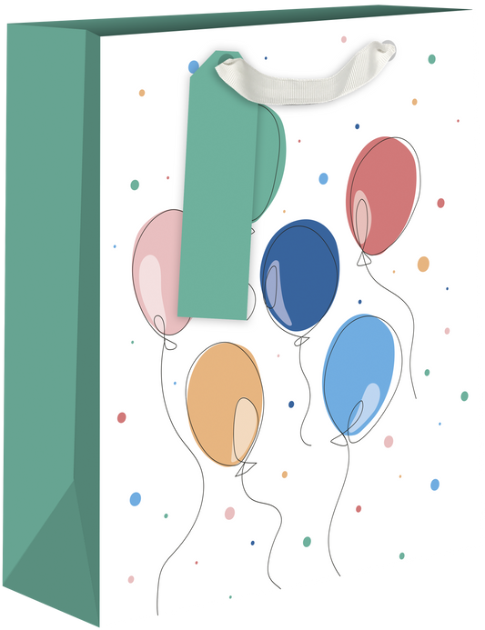 A white gift bag with a teal-green side panel and white handle, decorated with a pattern of colorful balloons in pink, blue, red, and orange, and small confetti dots.