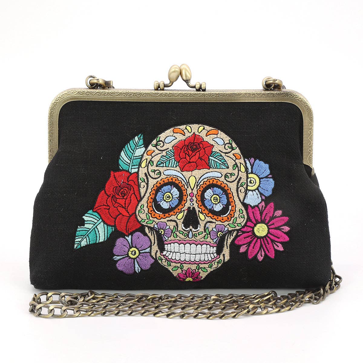 Black handbag with colorful skull and floral design on a white background