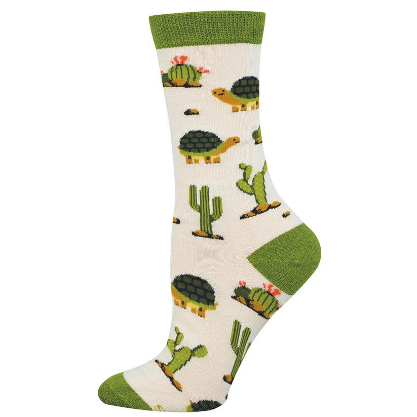 White Socksmith socks with turtles and cactus images on a white background