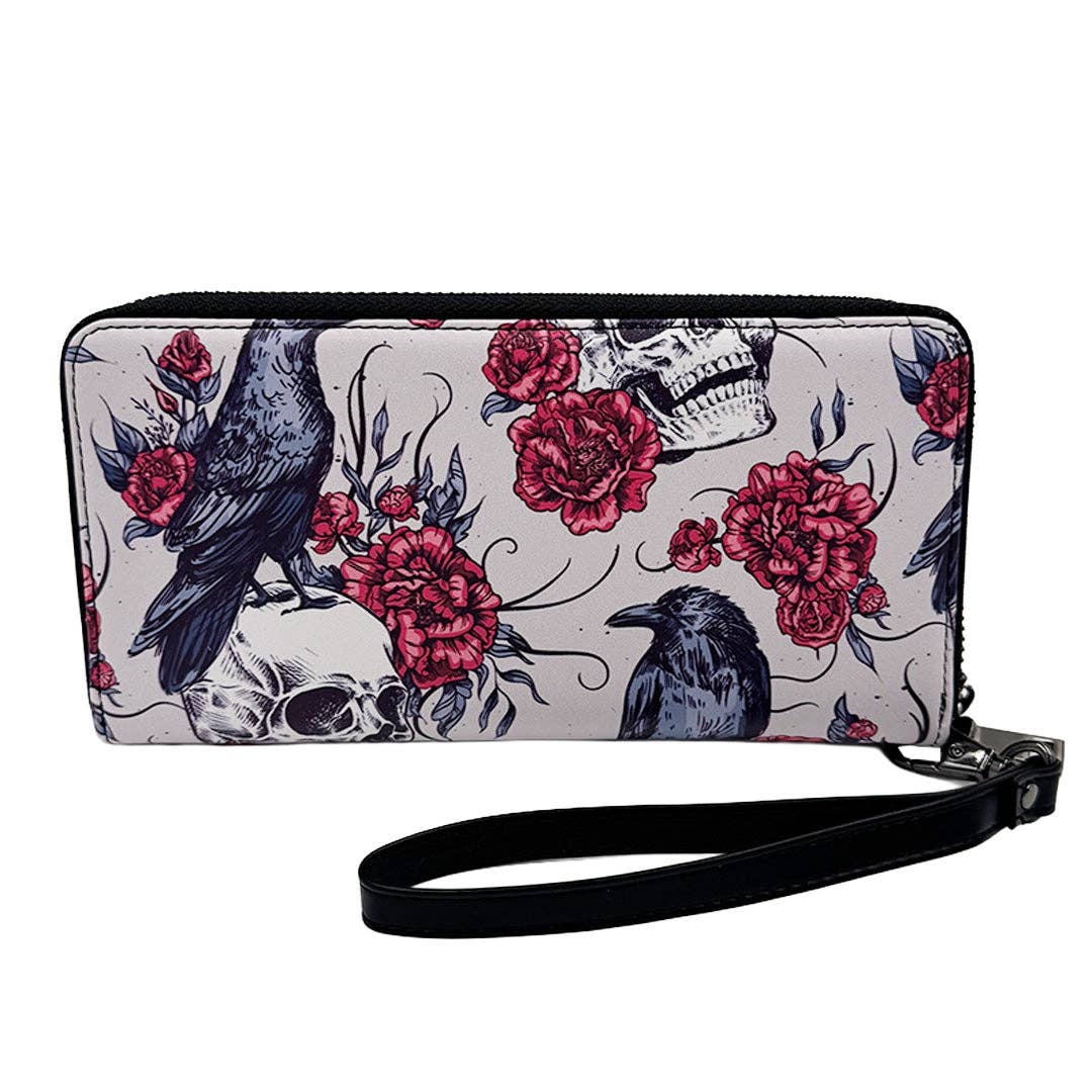 Wristlet Wallet with skull, raven, and rose design on a white background