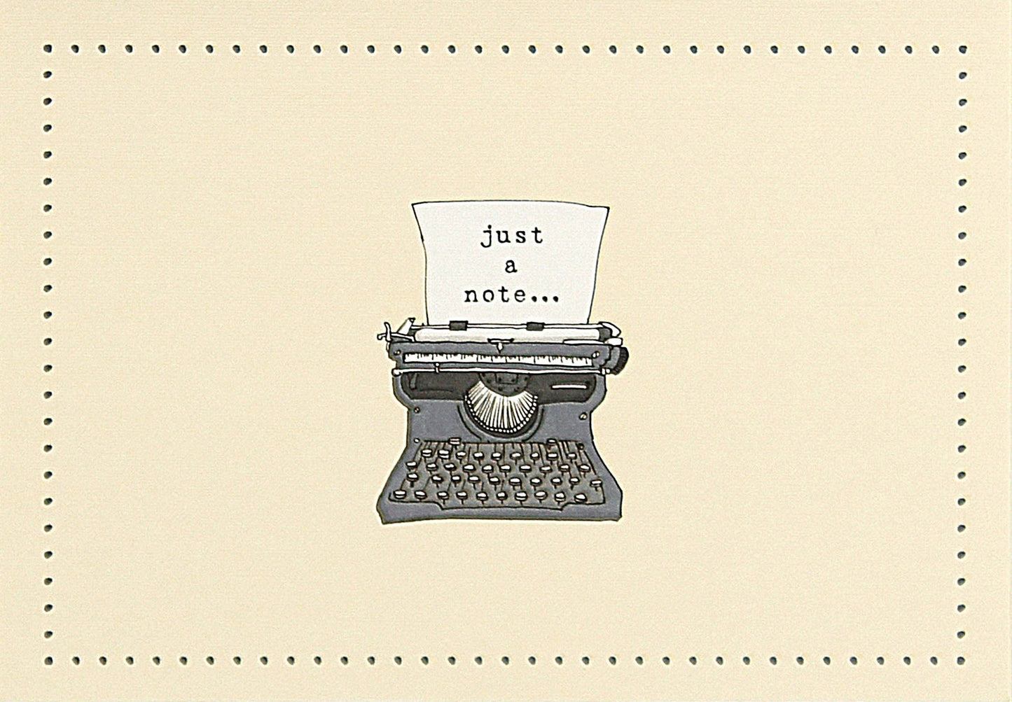 Vintage typewriter with a piece of paper reading 'just a note...' on a notecard with a beige background