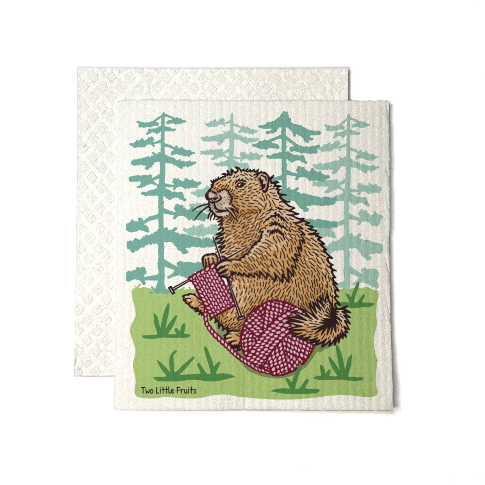 Swedish Dishcloth with marmot knitting design in a forest setting.