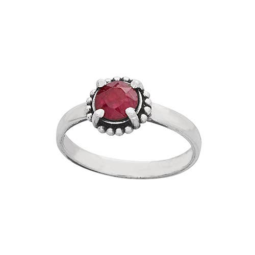 Sterling Silver ring with a red gemstone on a white background
