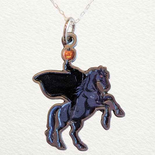 A Headless Horseman Pendant necklace on a chain on a white background.