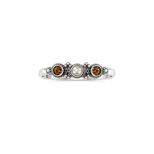 Sterling silver ring with Pearl and Citrine gemstones on a white background