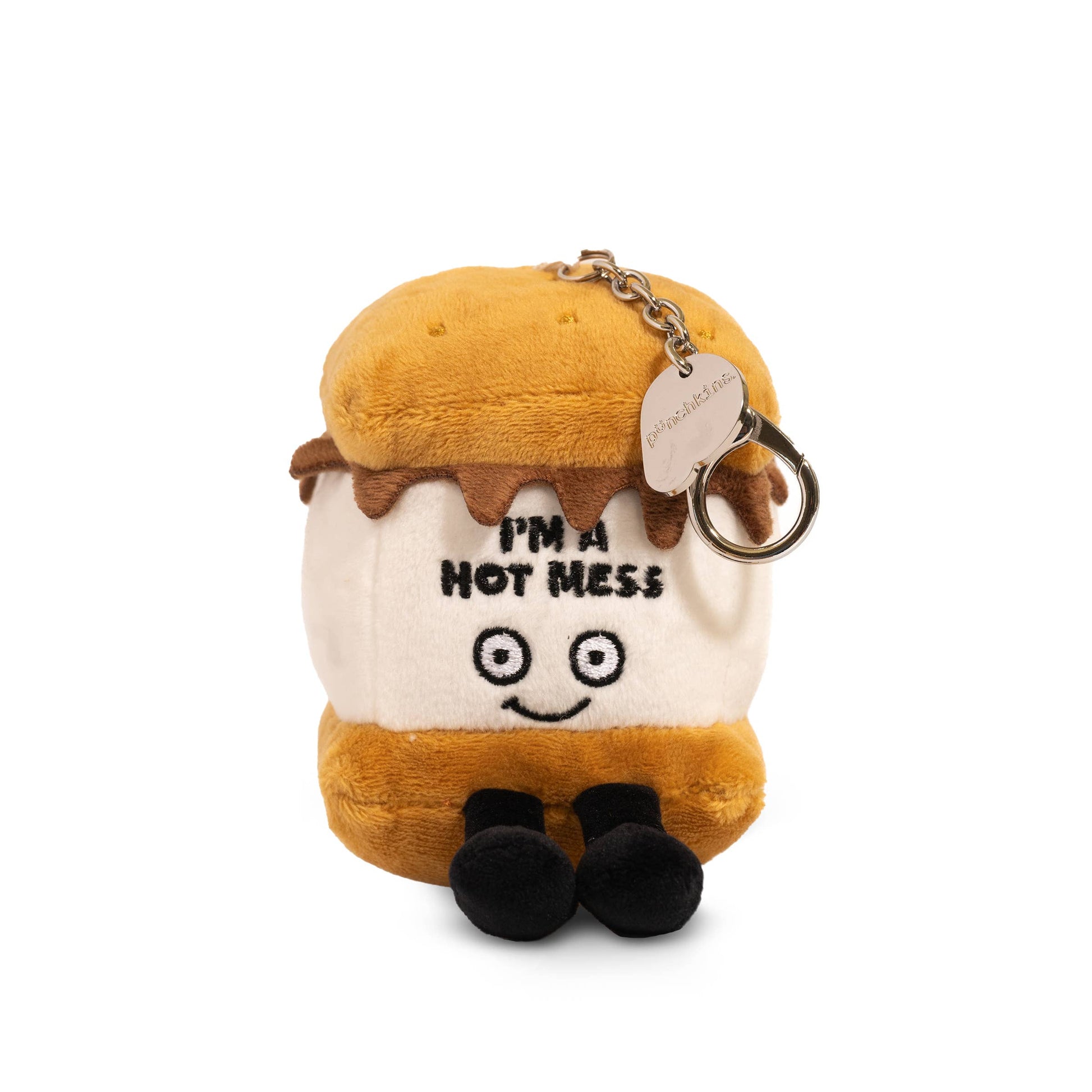 Plush keychain shaped like a smore with a smiley face and text on a white background