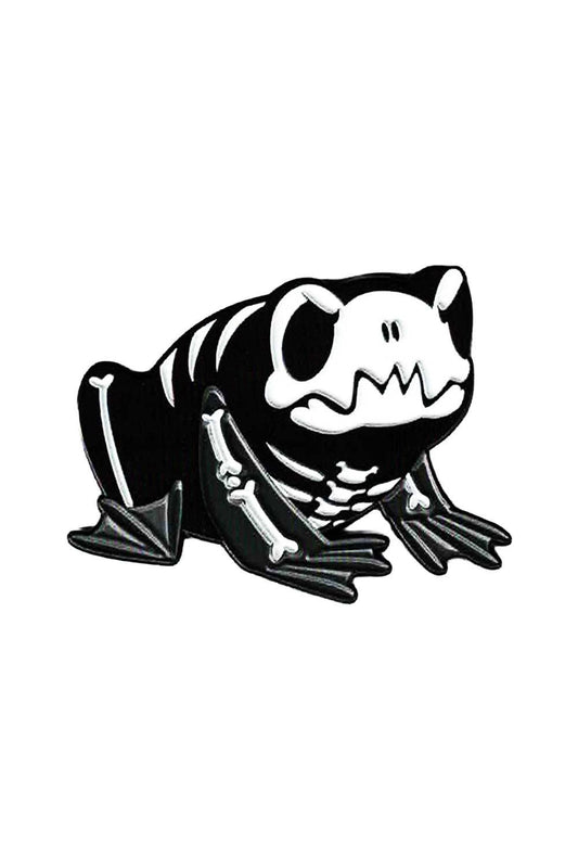 Black and white skeleton toad pin on a white background