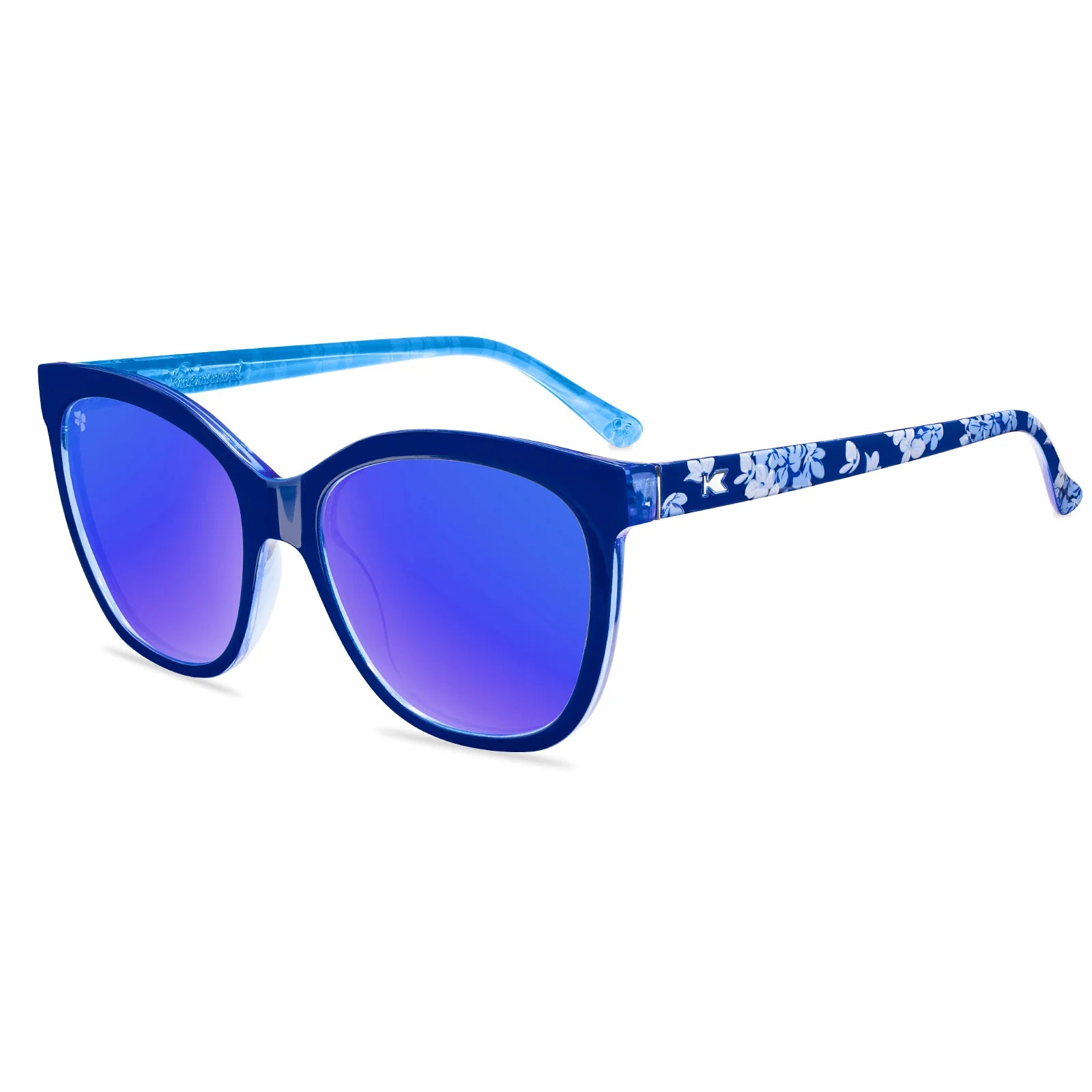 Blue sunglasses with floral patterned arms on a white background
