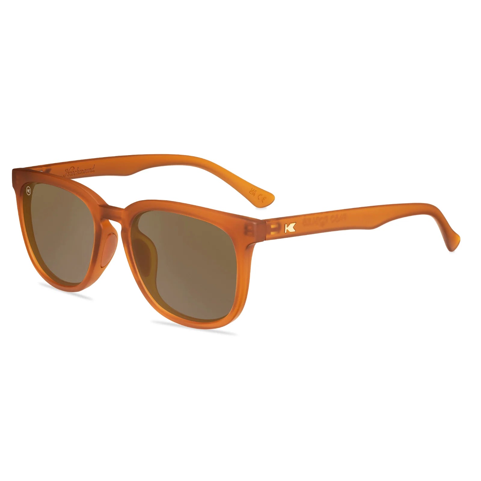 Burnt Orange Knockaround sunglasses on a white background