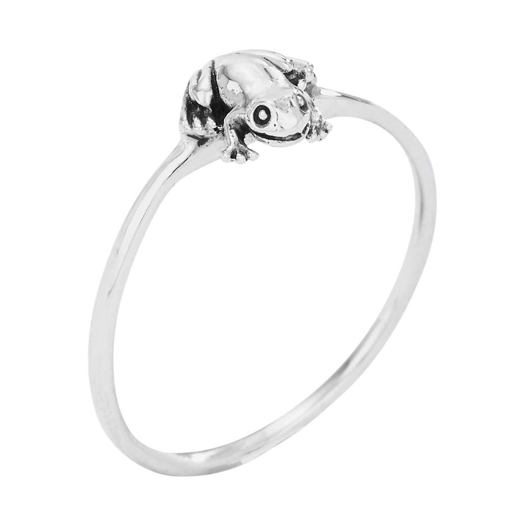 Silver ring with a frog design on a white background