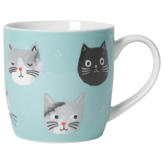 Teal mug with cat faces on a white background