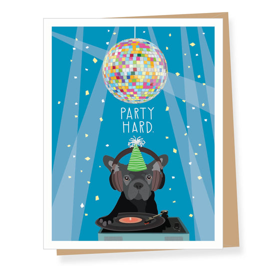 A greeting card featuring a cartoon French bulldog DJ at a turntable under a disco ball, with the text 'PARTY HARD.' on a blue background, shown with a kraft envelope behind it.