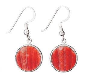 Pair of red circular shell earrings on white background
