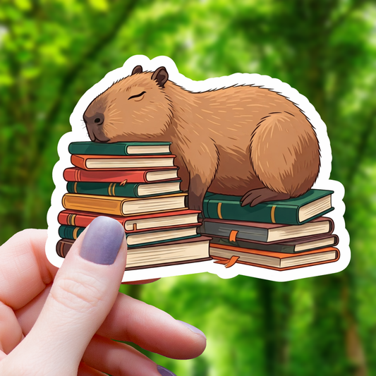 Capybara Sleeping on Books Sticker