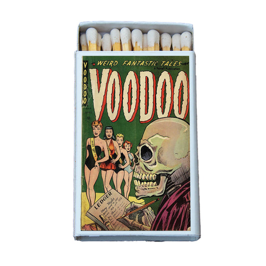 Matchbox with 'Voodoo' comic book cover design on a white background