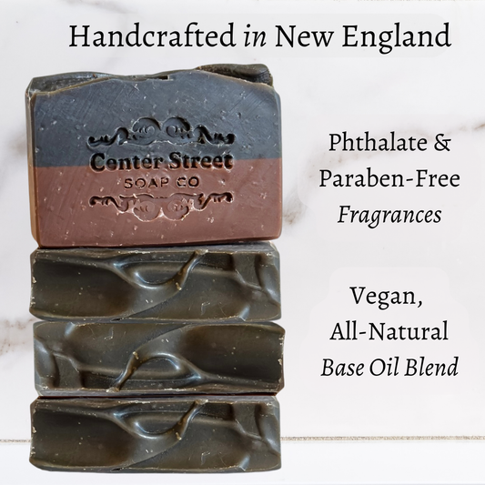 Stacked bars of soap with 'Center Street Soap Co' branding, text about product features on a light background.