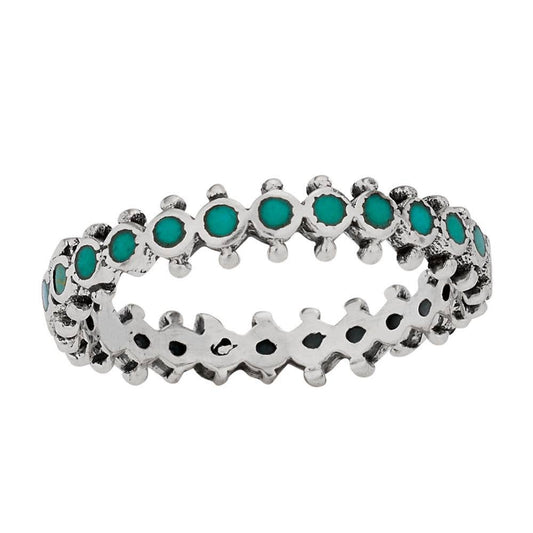 Sterling Silver ring with Turquoise gemstones on a white background