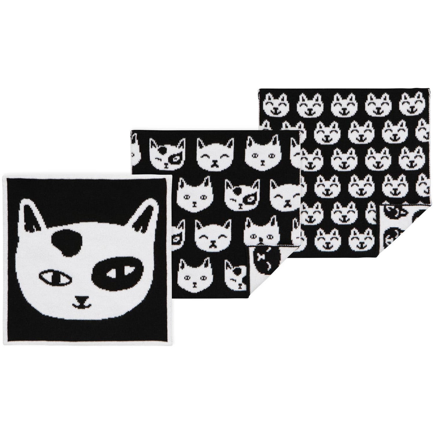 Set of dish towels with black and white cat patterns on a white background
