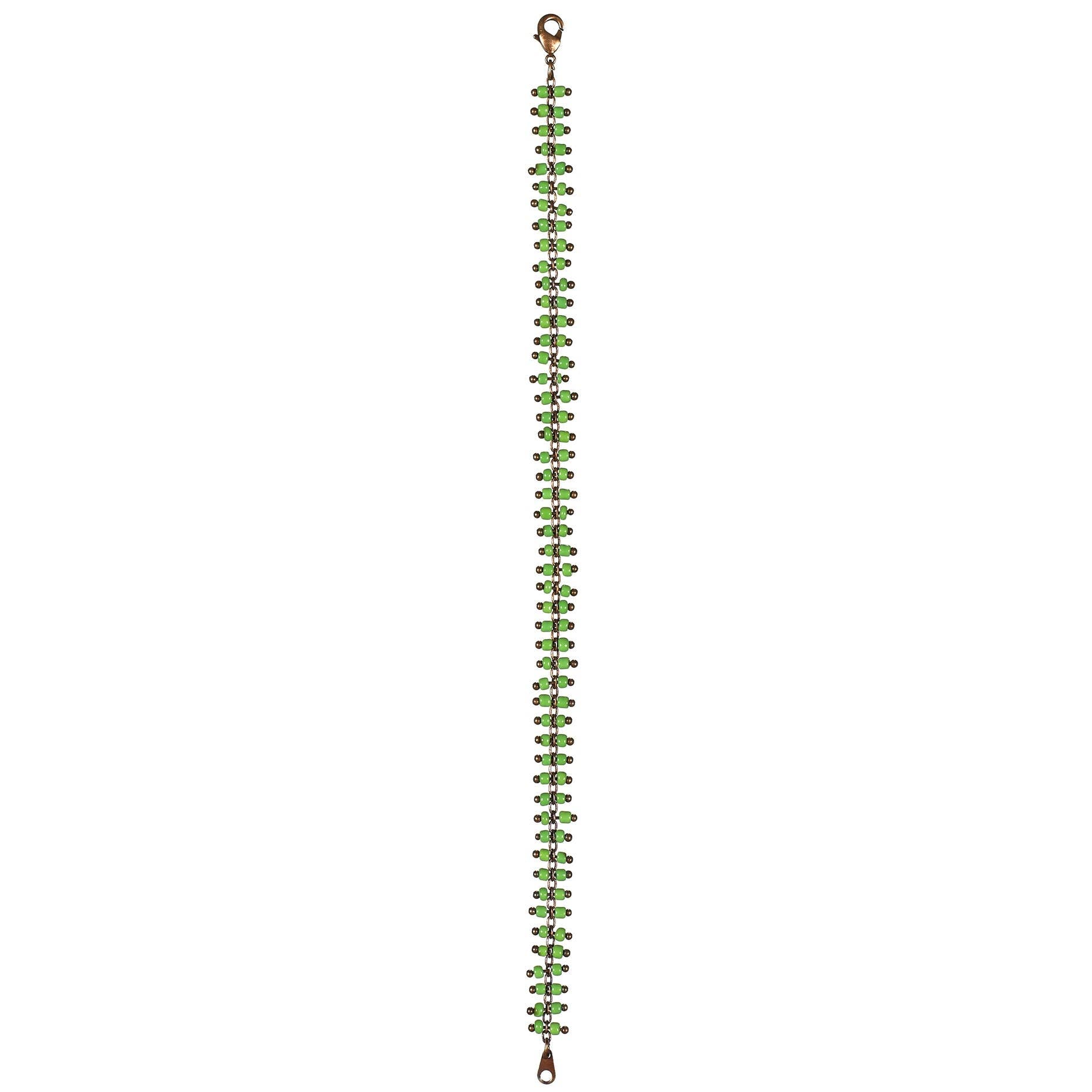 Green beaded bracelet with a metal clip on a white background