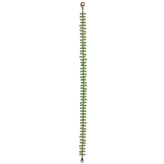 Green beaded bracelet with a metal clip on a white background