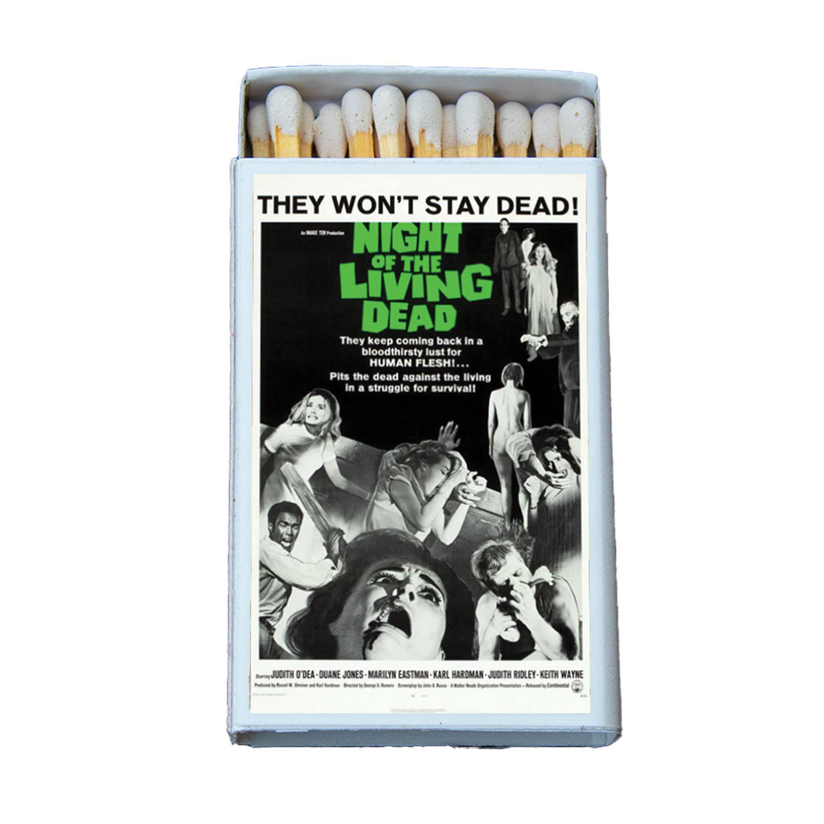 A novelty matchbox styled like a vintage movie poster for the film 'Night of the Living Dead'. The matchbox is open, showing white match heads with yellow tips, and the front features the movie poster artwork with the title in green text.
