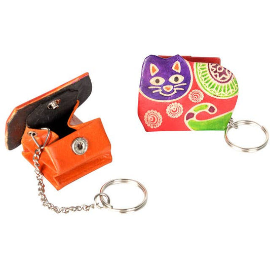 Two keychains, one orange and one colorful cat design, on a white background.