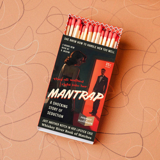 Book of matches titled 'Mantrap' on a textured brown background