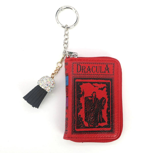 Keychain with a red 'Dracula' book design on a white background